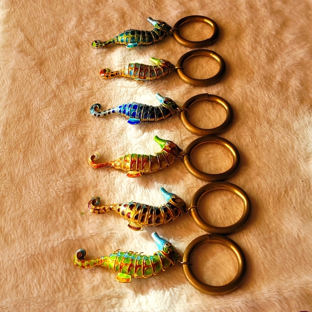 6 movable napkin rings   hand painted  Seahorses in various shades